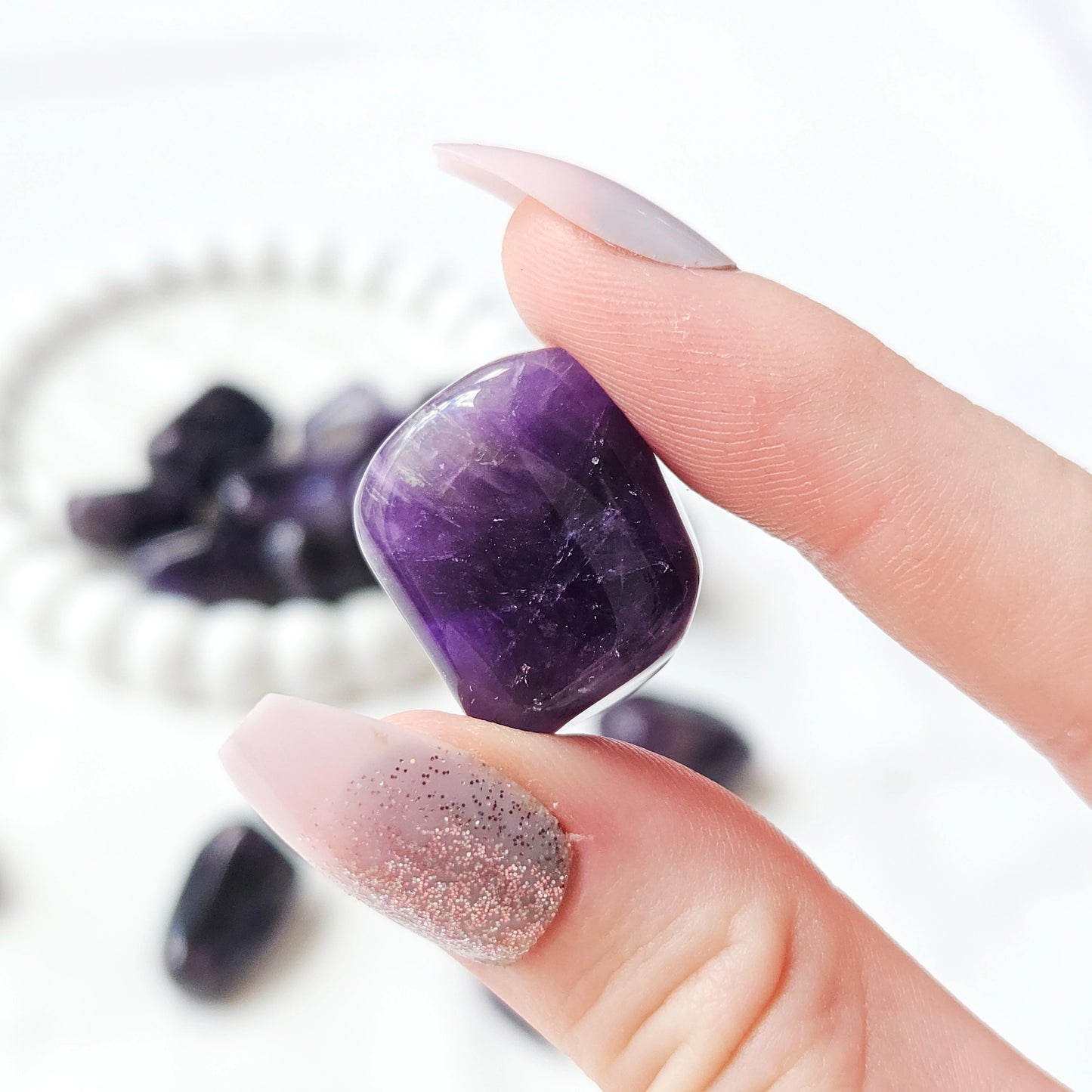 Amethyst Tumbled Stones In Hand