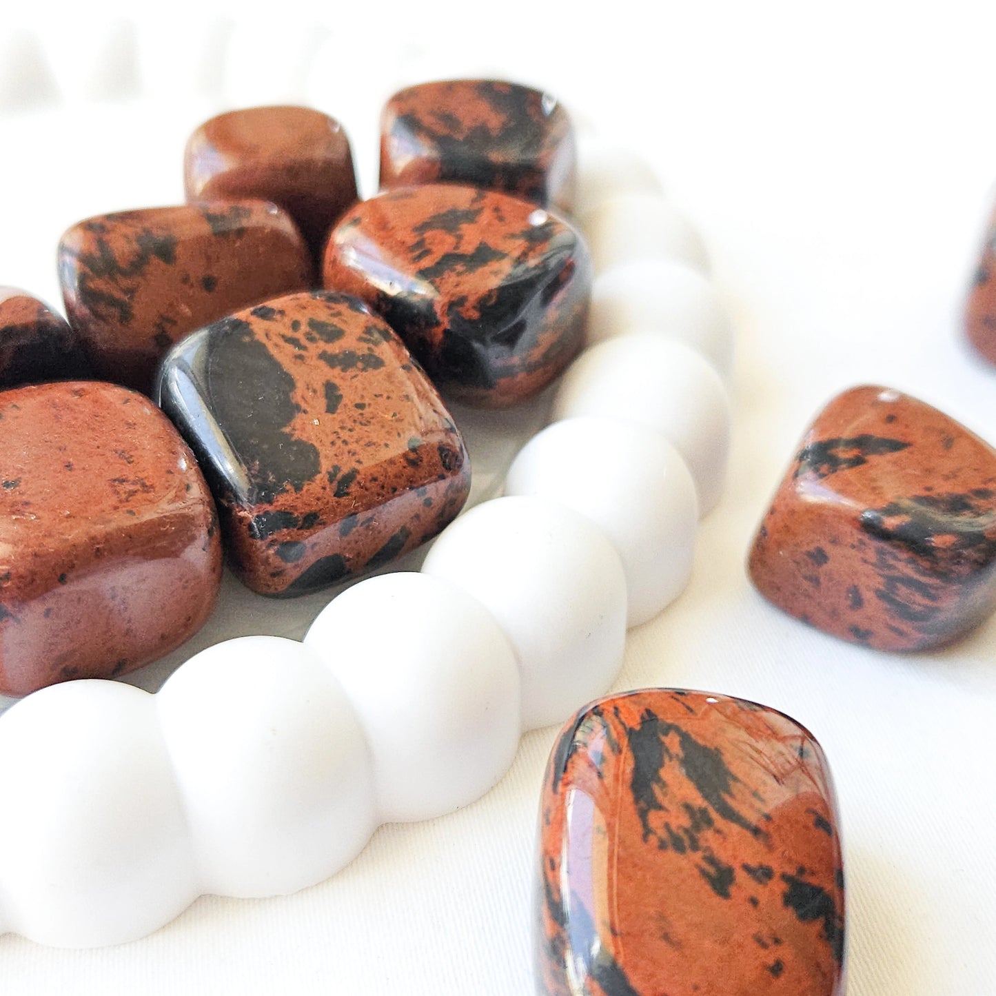 Mahogany Obsidian Tumbled Stones Close Up