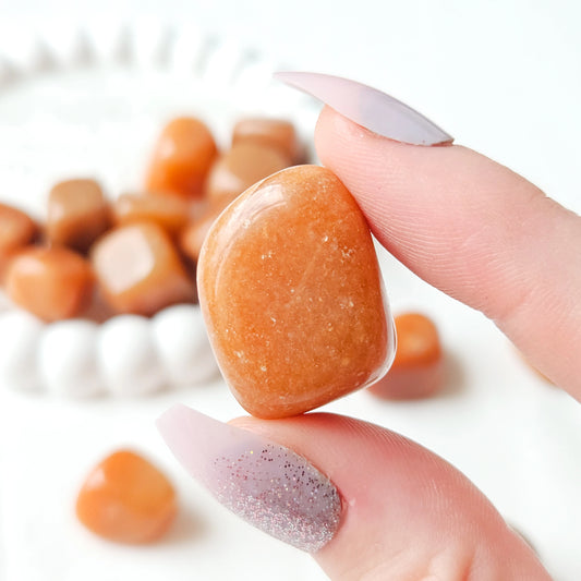 Red Aventurine Tumbled Stones In Hand