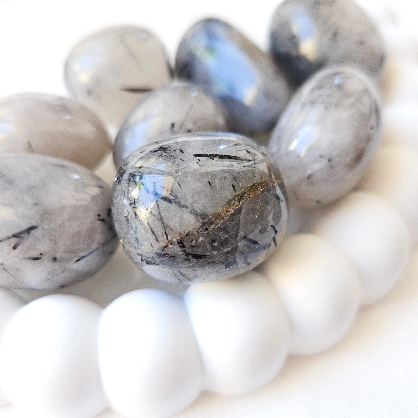 Tourmalinated Quartz Tumbled Stones Close Up
