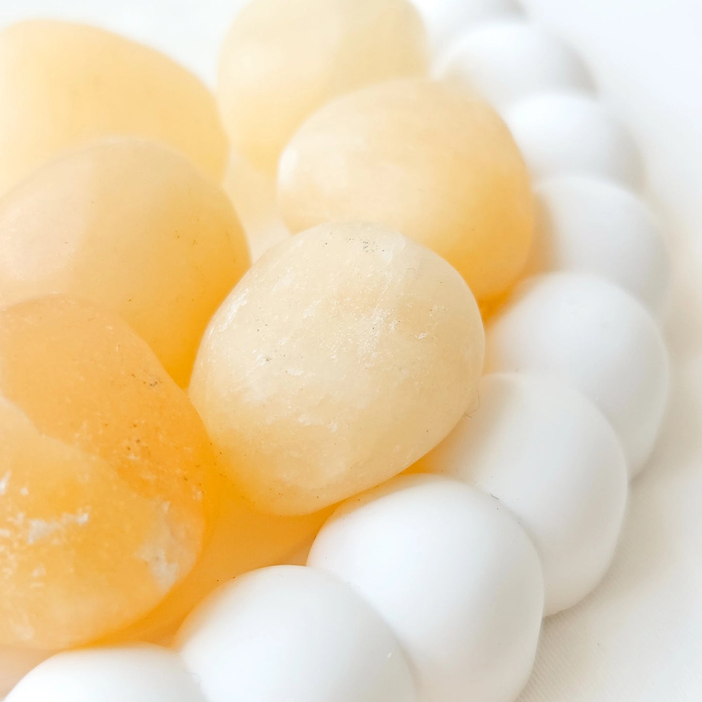Yellow Calcite Tumbled Stones Close Up